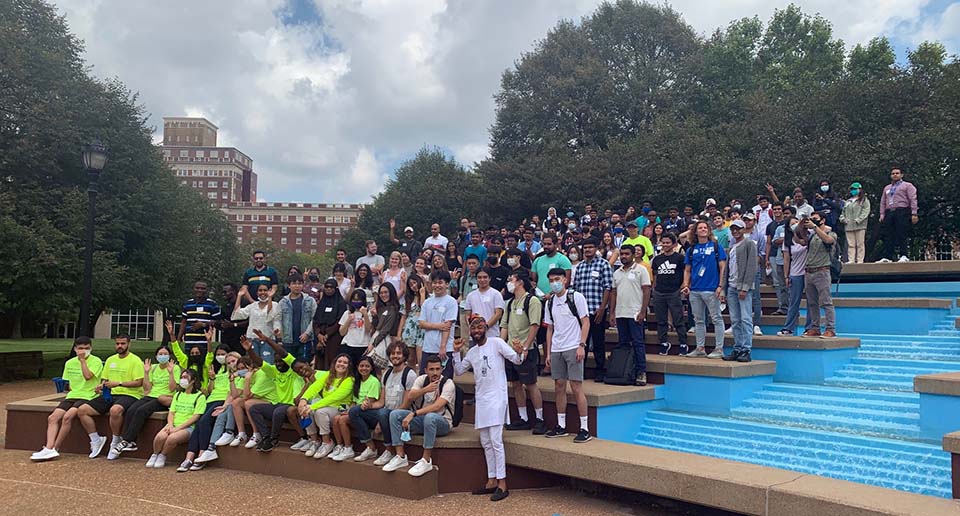 A group photo of new international students along with the international student ambassadors on the first day of international orientation.