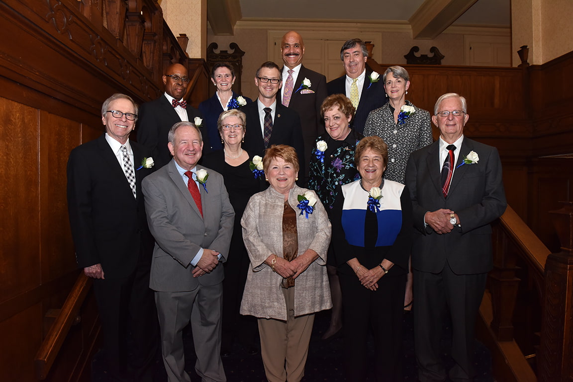 The third class of SLU LAW's Order of the Fleur de Lis Hall of Fame, pictured with Dean William P. Johnson.
