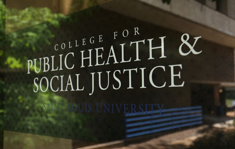 A plaque that reads "College for Public Health and Social Justice."