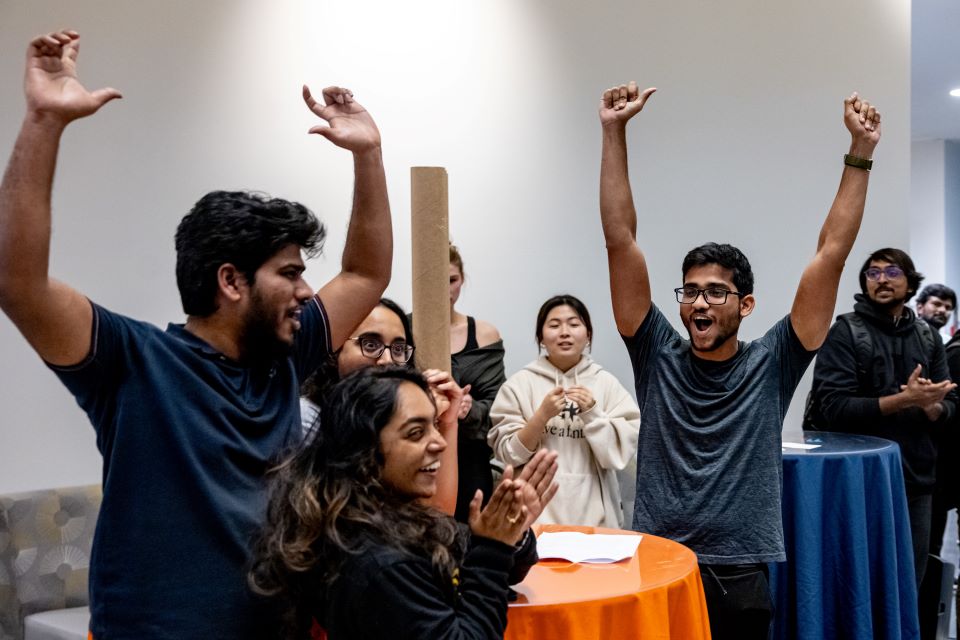 The winning student team celebrates their victory in the November 2024 Innovation Challenge. 