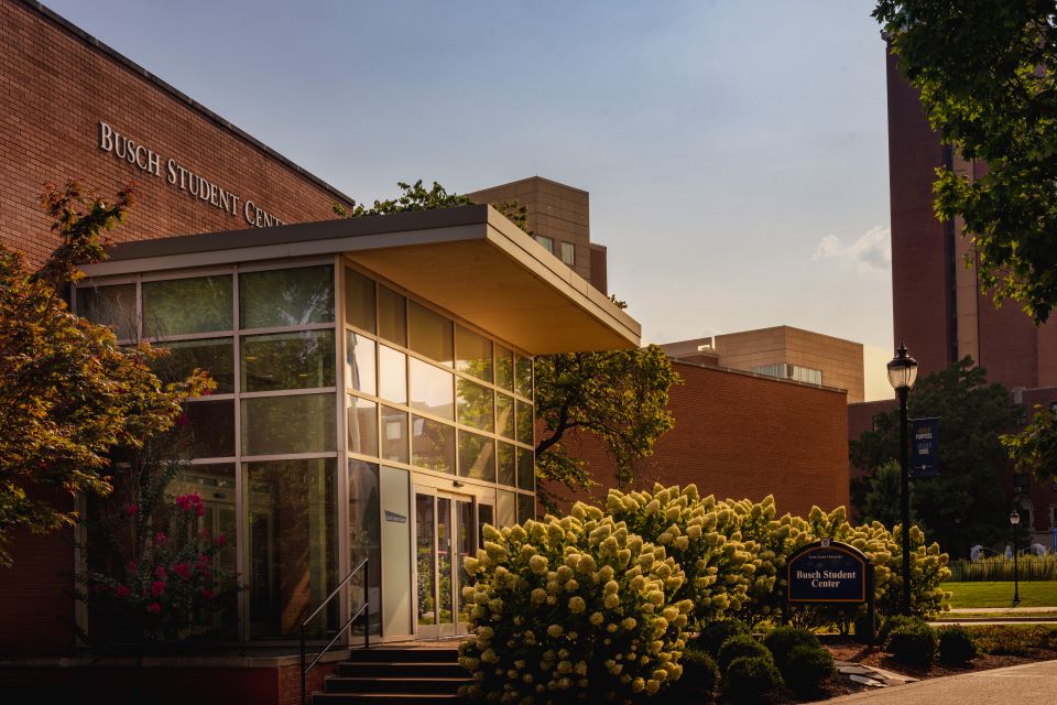 A photo of the Busch Student Center at sunset.