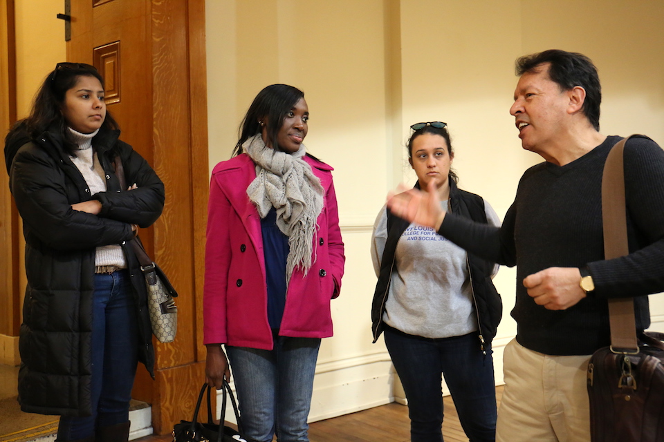 Dr. Fernando Serrano talks to students in the Old Courthouse of St. Louis