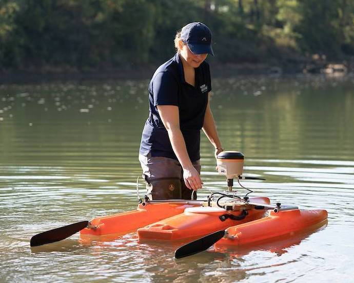 Amanda Cox uses Acoustic Doppler Current Profiler in Meramec River