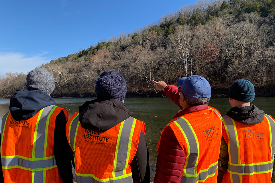 Dr. Ronaldo Luna with students on a site visit near a Missouri bridge