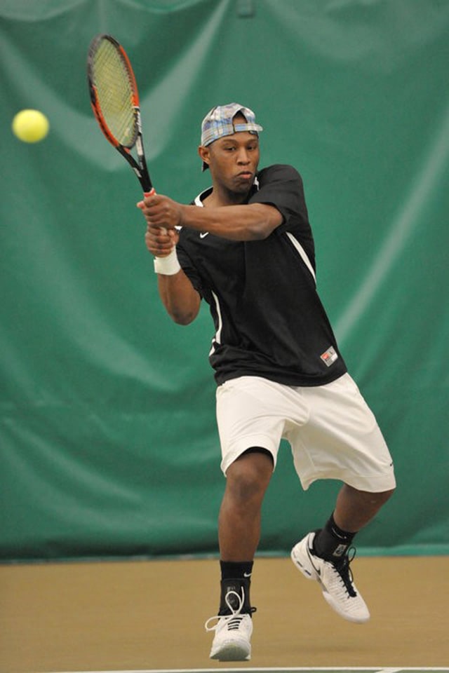 Beasley plays tennis indoors