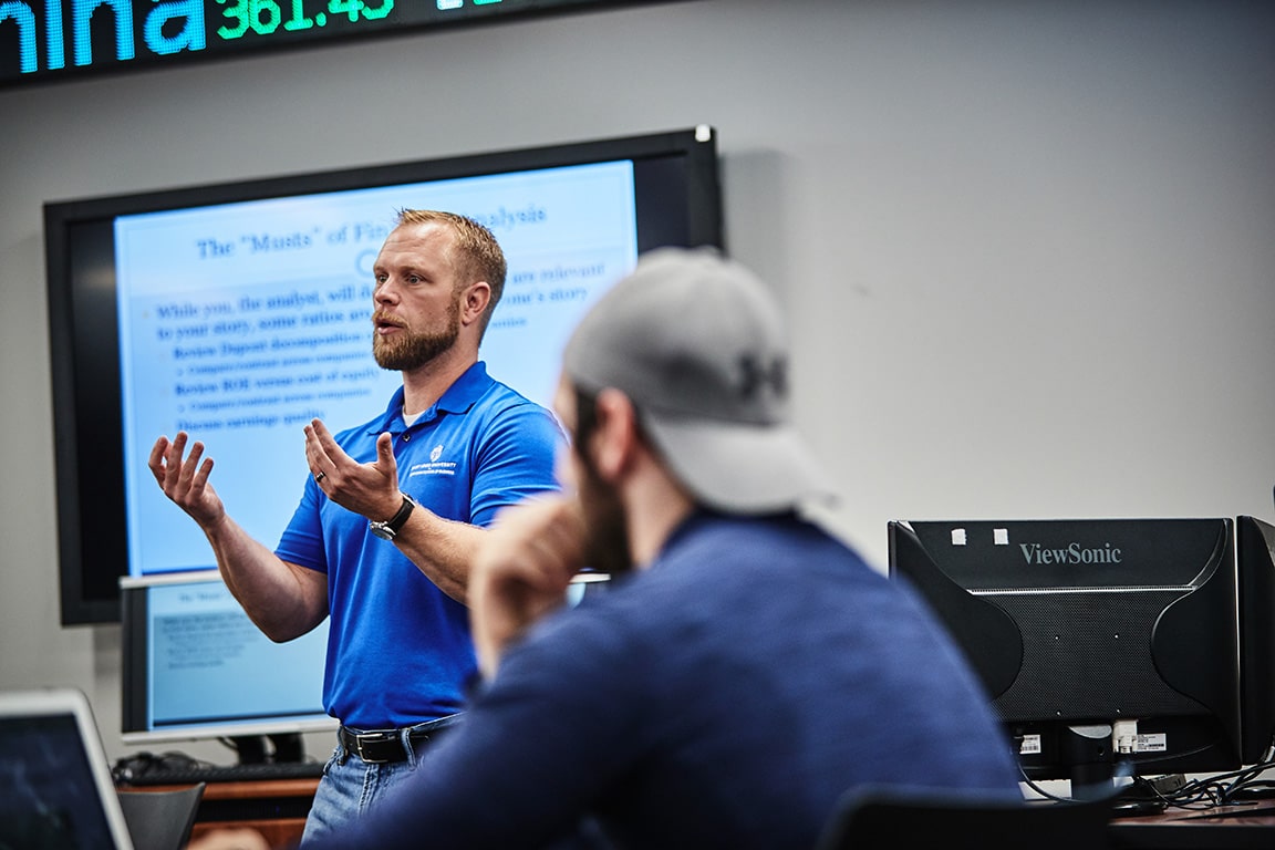 Dr. Thomas Doellman, associate professor of finance, lectures during a session of SLU's Applied Portfolio Management (APM) course