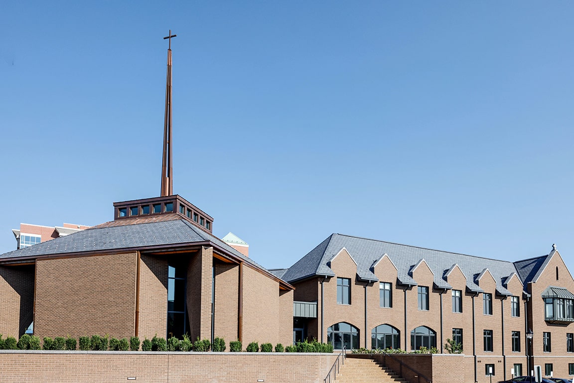 Exterior of the Jesuit Center at Saint Louis University during the day